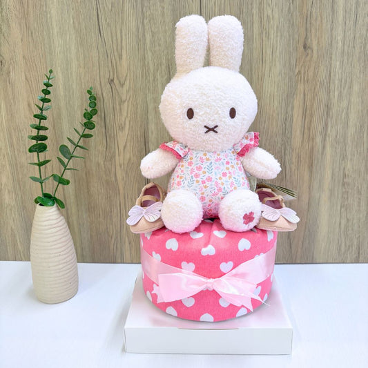 1-Tier Miffy Blossom Diaper Cake Baby Hamper with miffy plush topper, baby blanket, shoes, bib and diapers.