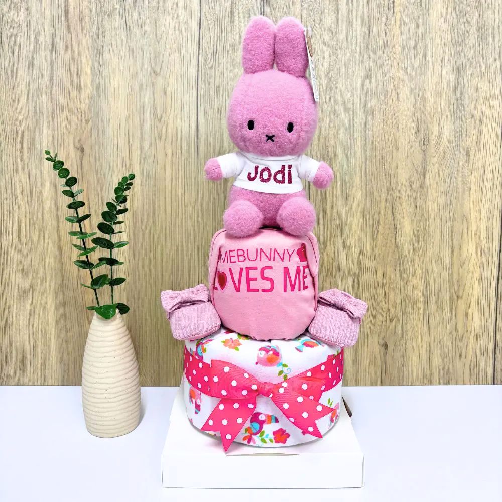 Cotton Candy Pink Miffy with personalized tee shirt on top of a diapercake.