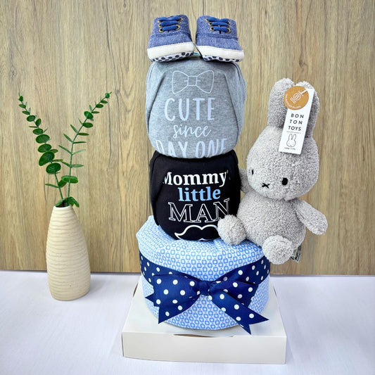 3-tier Miffy diaper cake baby gift hamper with Terry cream miffy bunny rabbit soft toy, short sleeved baby rompers, baby bib, baby shoes, socks, baby swaddle blanket, and premium Huggies disposable diapers, wrapped with ribbons.