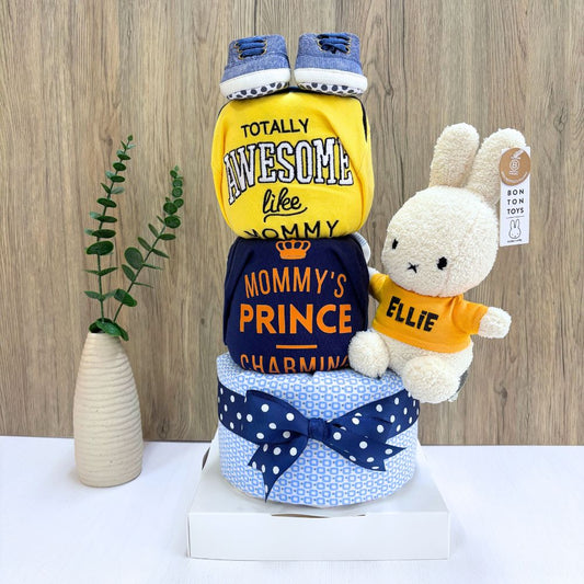 Diaper cake baby gift hamper with shoes, yellow onesie, swaddle blanket and personalized name Miffy plush toy